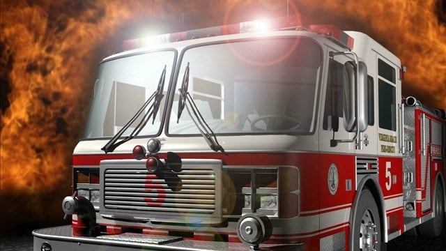 Firefighters monitor burning tire piles at Nevada business