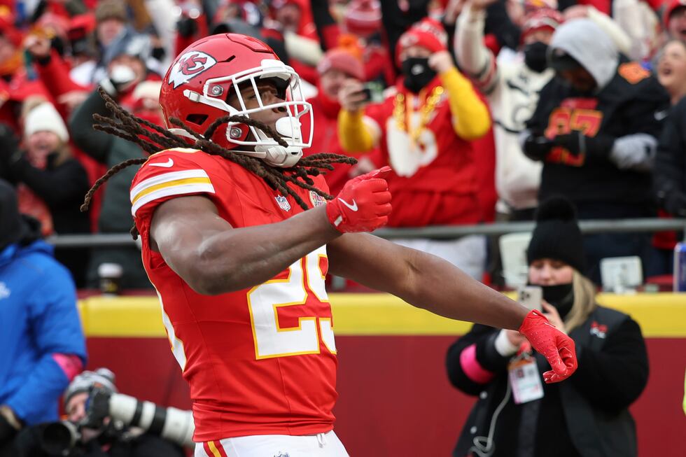 Kansas City Chiefs running back Kareem Hunt celebrates after scoring during the first half of...