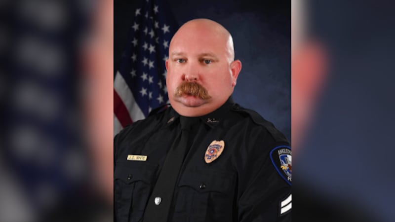 The Angleton Police Department said Sgt. J.D. White died after being hit by a car while...