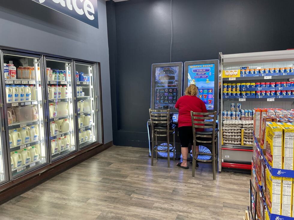 Inside a Missouri grocery store, skill games can be found in the refrigerator section - tucked...