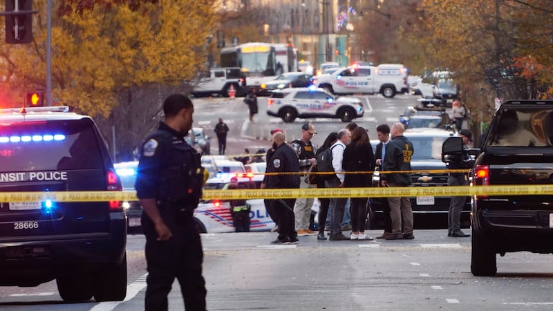 Streets were blocked after reports that two National Guard soldiers were shot near the White...