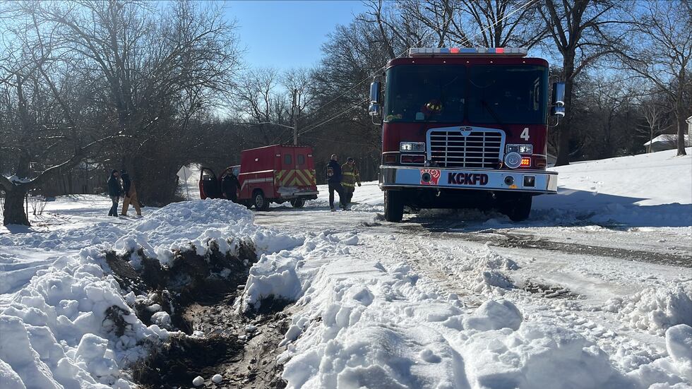 KANSAS CITY, Kan. -- A firetruck became stuck in the snow while responding to a barn fire on...