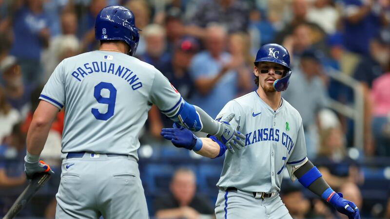 Kansas City Royals' Bobby Witt Jr., right, celebrates his home run against the Tampa Bay Rays...