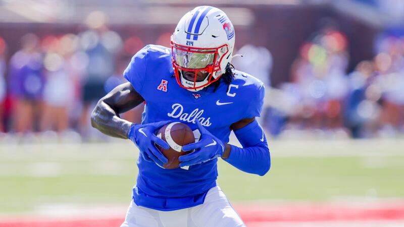 SMU wide receiver Rashee Rice looks to run after catching a during the first half of an...