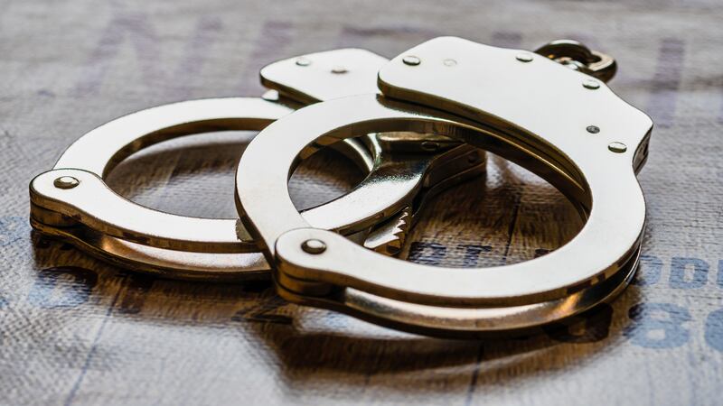 FILE - A woman was arrested after allegedly throwing hot chicken grease on her boyfriend.