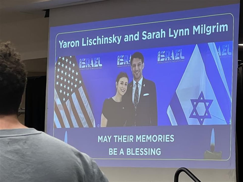 The image of a happy couple projected on a screen at the Jewish Community Campus Thursday...