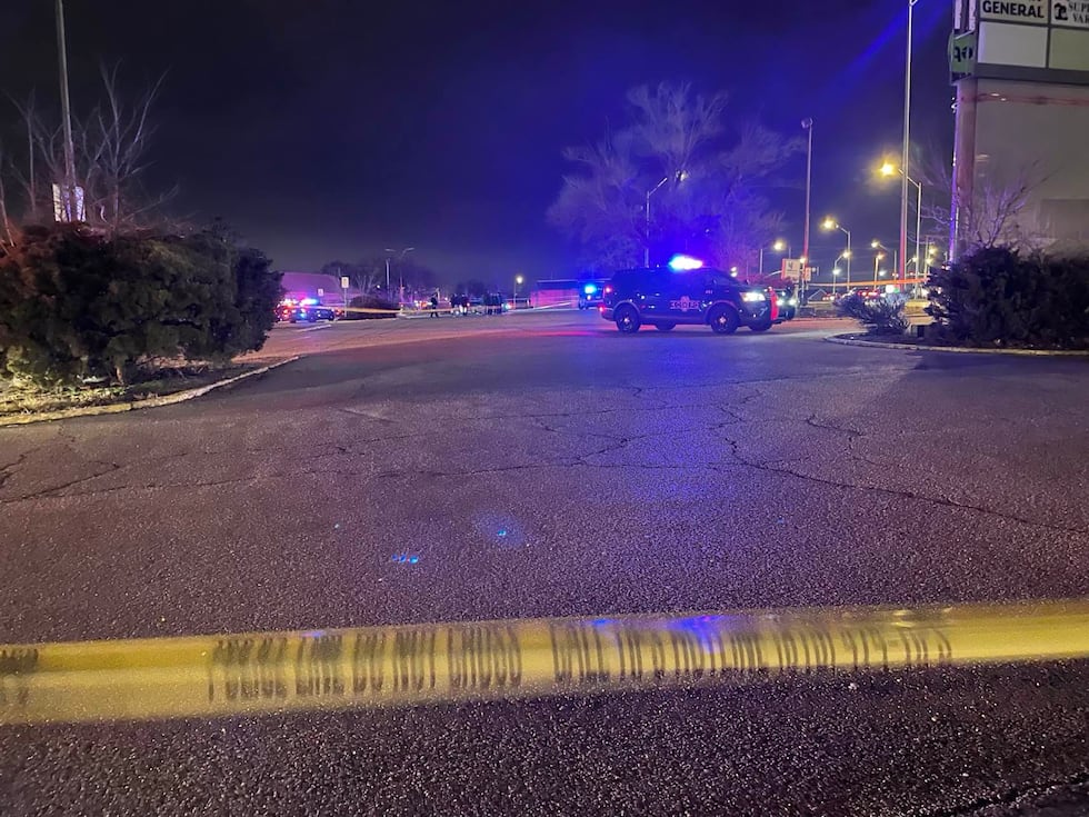 Police investigate a homicide near 87th and Blue Ridge Blvd. on Jan. 2, 2024.