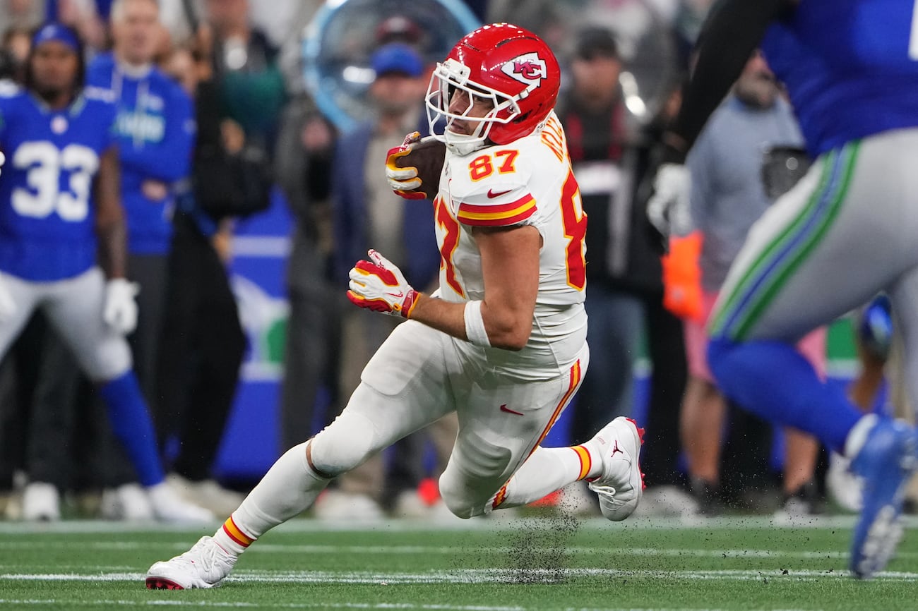 Kansas City Chiefs tight end Travis Kelce (87) runs with the ball during the second half of an NFL football game against the Seattle Seahawks in Seattle, Sunday, Oct. 25, 2026