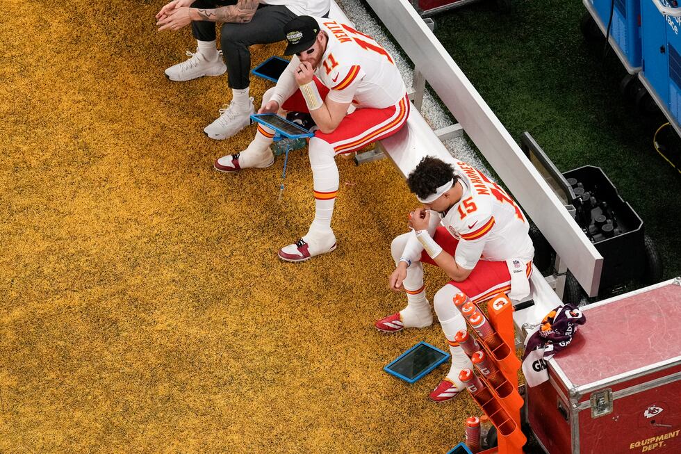 Kansas City Chiefs quarterback Patrick Mahomes (15) sits on the bench during the first half of...