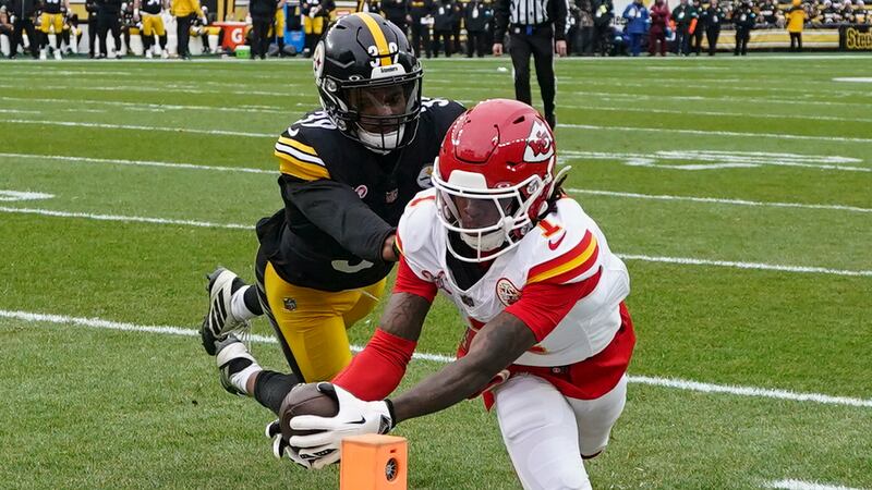 Kansas City Chiefs wide receiver Xavier Worthy (1) scores a touchdown against Pittsburgh...