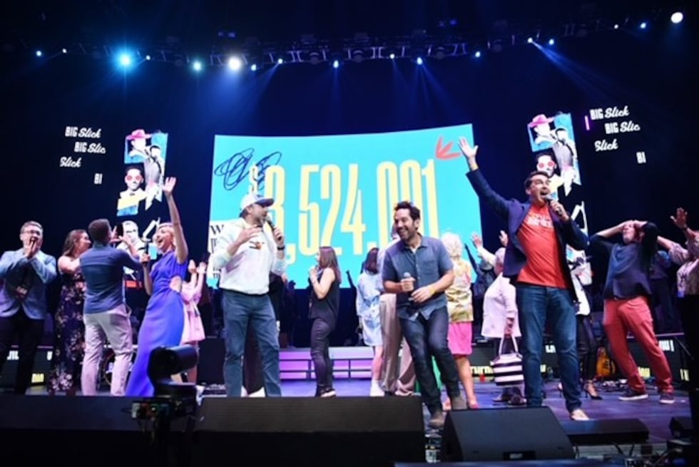 Big Slick participants celebrate more than $3.5 million in money raised during the 2023 event.