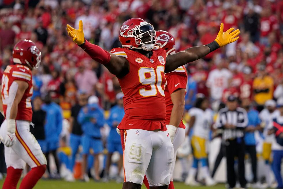 Kansas City Chiefs defensive end Charles Omenihu (90) celebrates a tackle during an NFL...