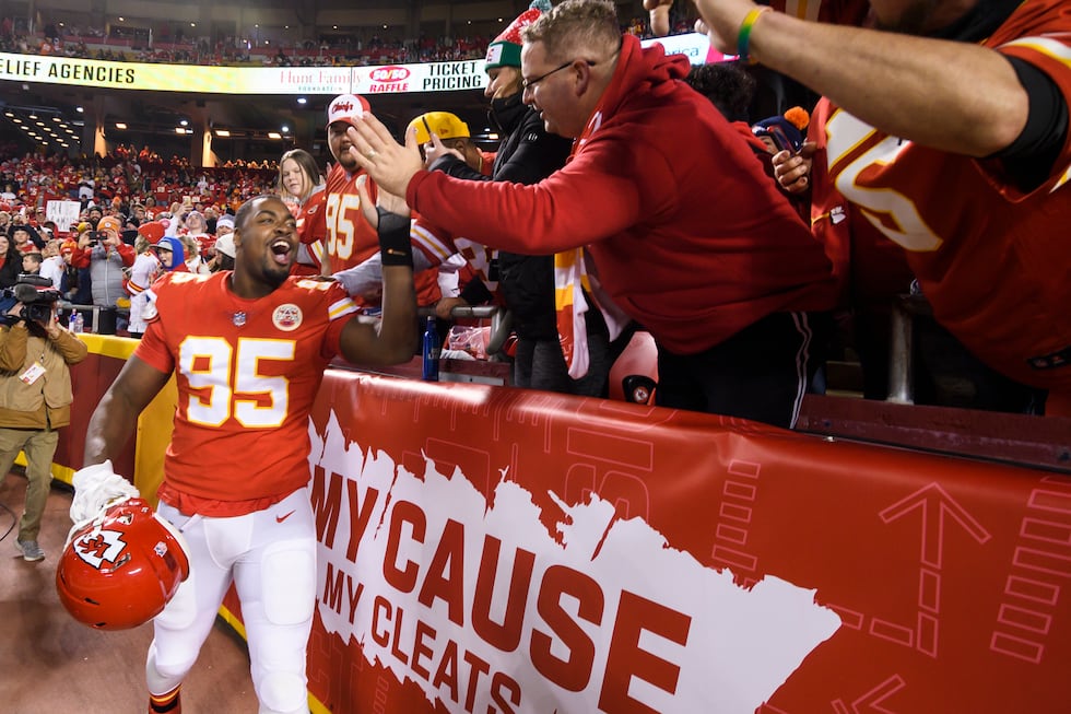 Kansas City Chiefs defensive end Chris Jones (95) greets fans in front of a My Cause My Cleats...