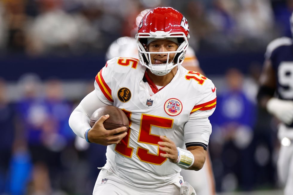 Kansas City Chiefs quarterback Patrick Mahomes (15) runs with the ball during the first half...