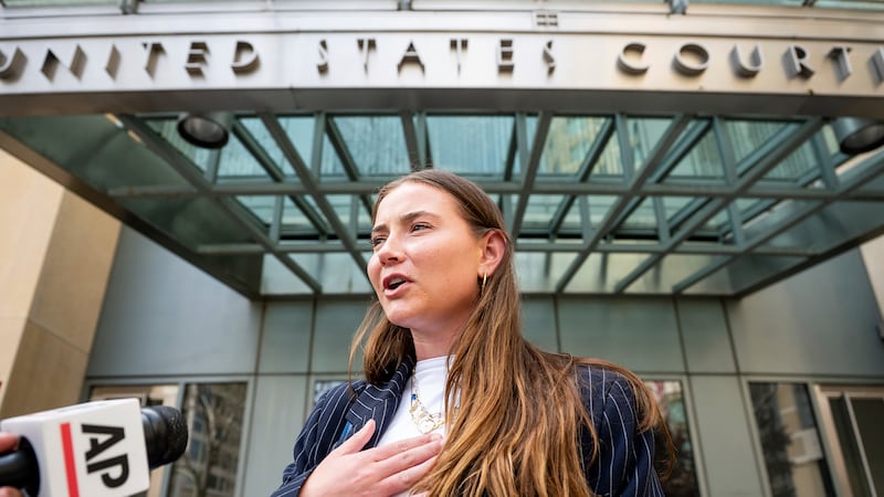 FILE - College soccer player Lexi Drumm leaves federal court during a hearing for a landmark...