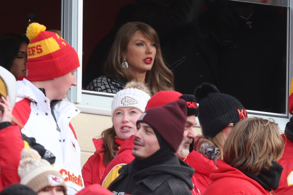 Taylor Swift watches from a suite during the first half of an NFL football AFC divisional...