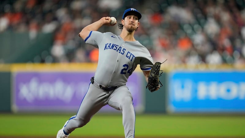 Kansas City Royals starting pitcher Michael Lorenzen throws during the first inning of a...