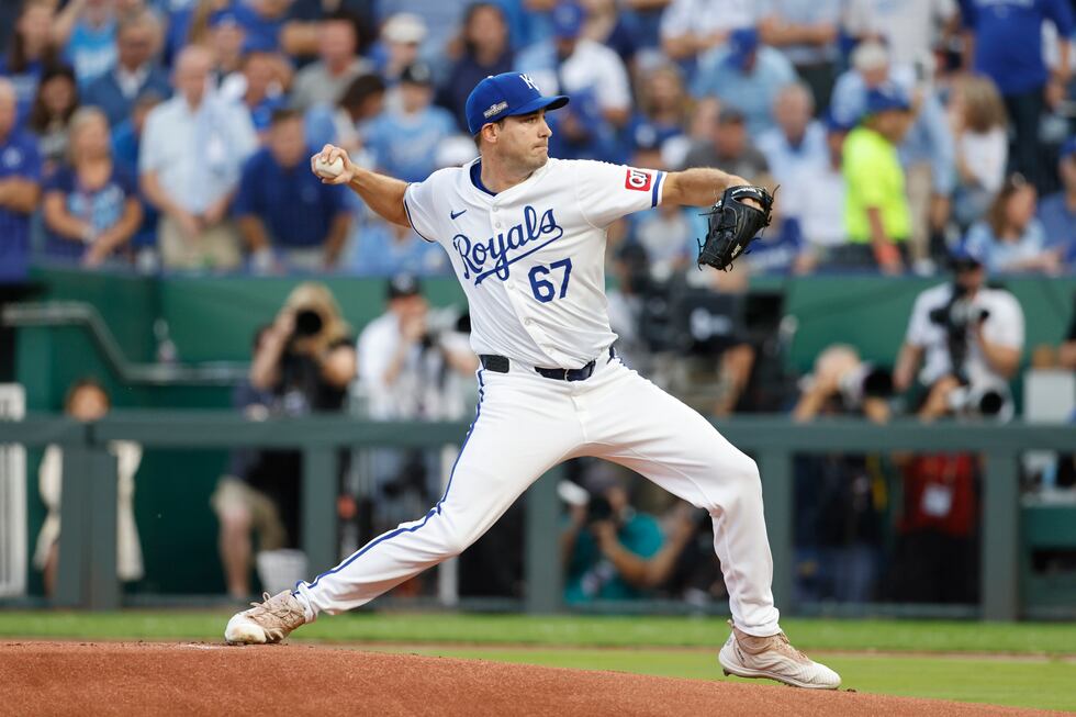 Kansas City Royals starting pitcher Seth Lugo throws during the first inning in Game 3 of an...