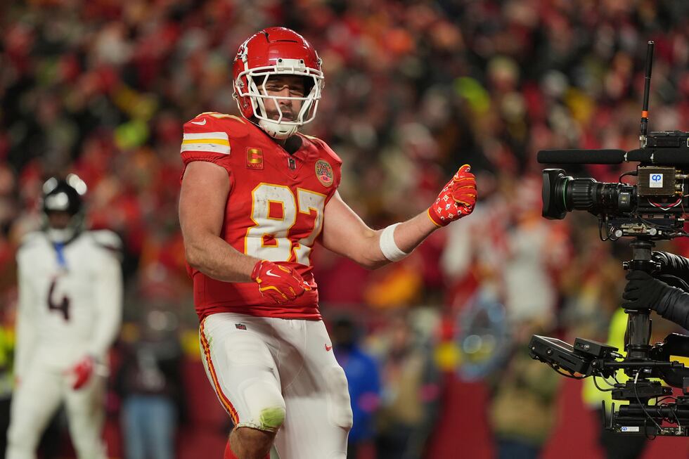 Kansas City Chiefs tight end Travis Kelce celebrates after scoring during the second half of...