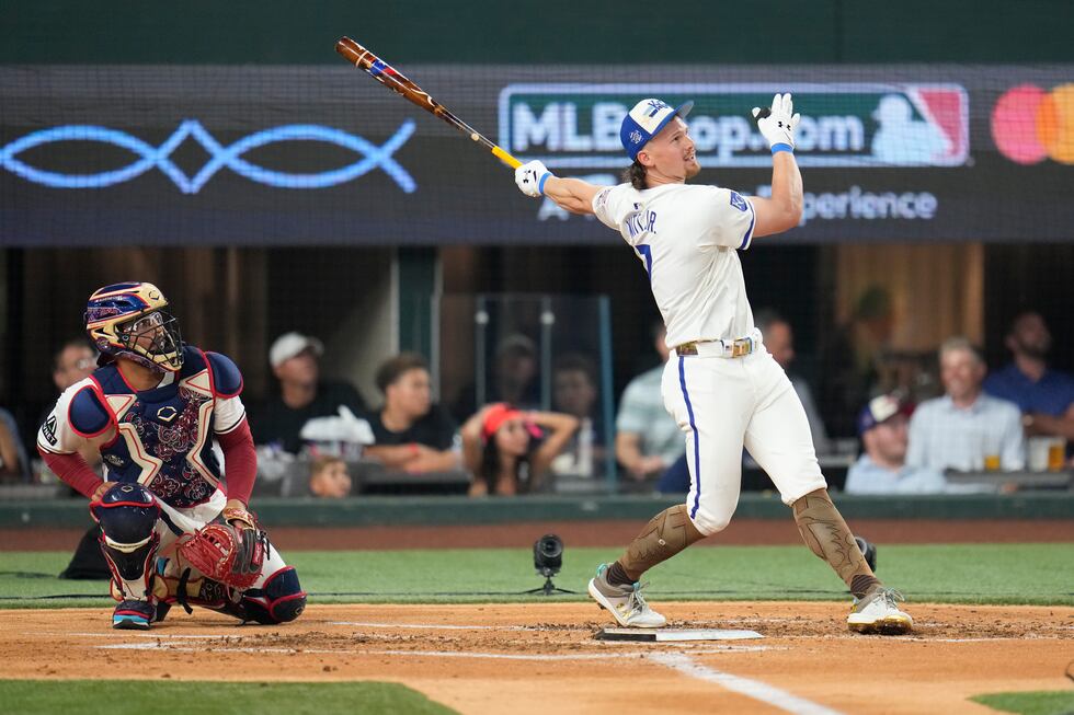American League's Bobby Witt Jr., of the Kansas City Royals, follows through during the MLB...