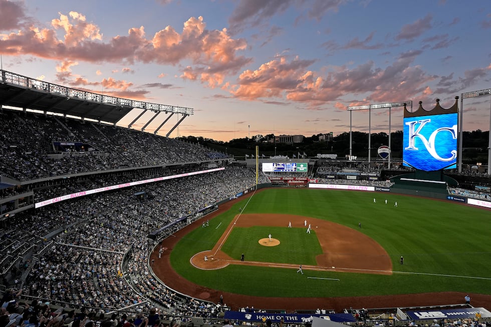 Fans watch during the fifth inning of a baseball game between the Kansas City Royals and the...