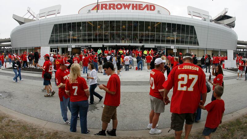 FILE - Kansas City Chiefs fans gather outside Arrowhead Stadium before a NFL football game...