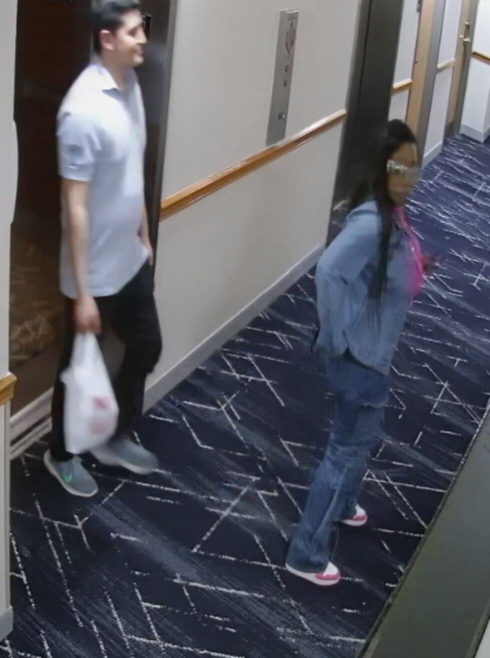 Surveillance video shows Danette Colbert and Kansas City sports reporter Adan Manzano at a...