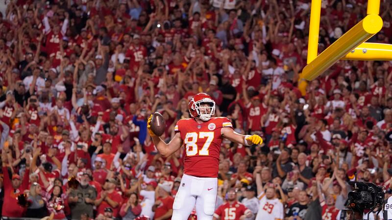 Kansas City Chiefs tight end Travis Kelce celebrates after scoring on a 4-yard touchdown catch...