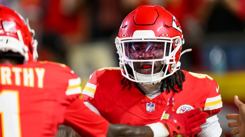 Kansas City Chiefs wide receiver Rashee Rice is congratulated after scoring a touchdown...