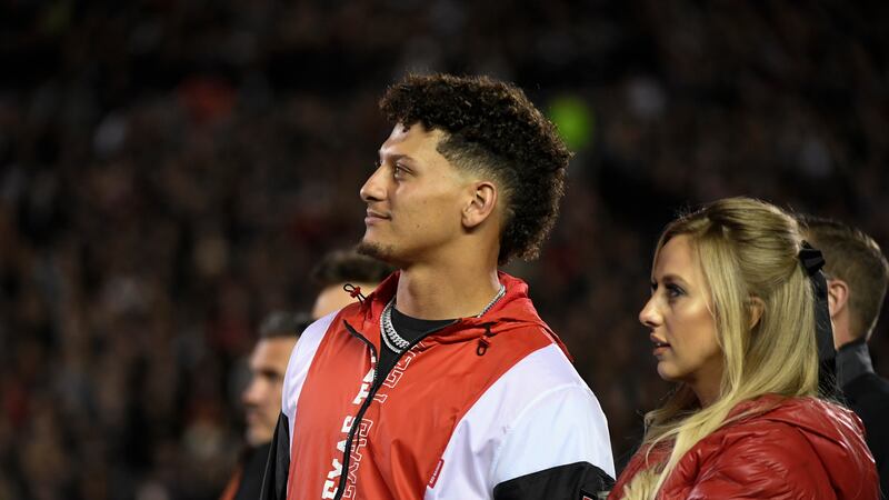 FILE: Former Texas Tech quarterback Patrick Mahomes stands with his wife Brittany Mahomes for...