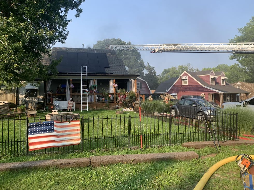 Crews in Independence extinguish a house fire on June 9, 2025.
