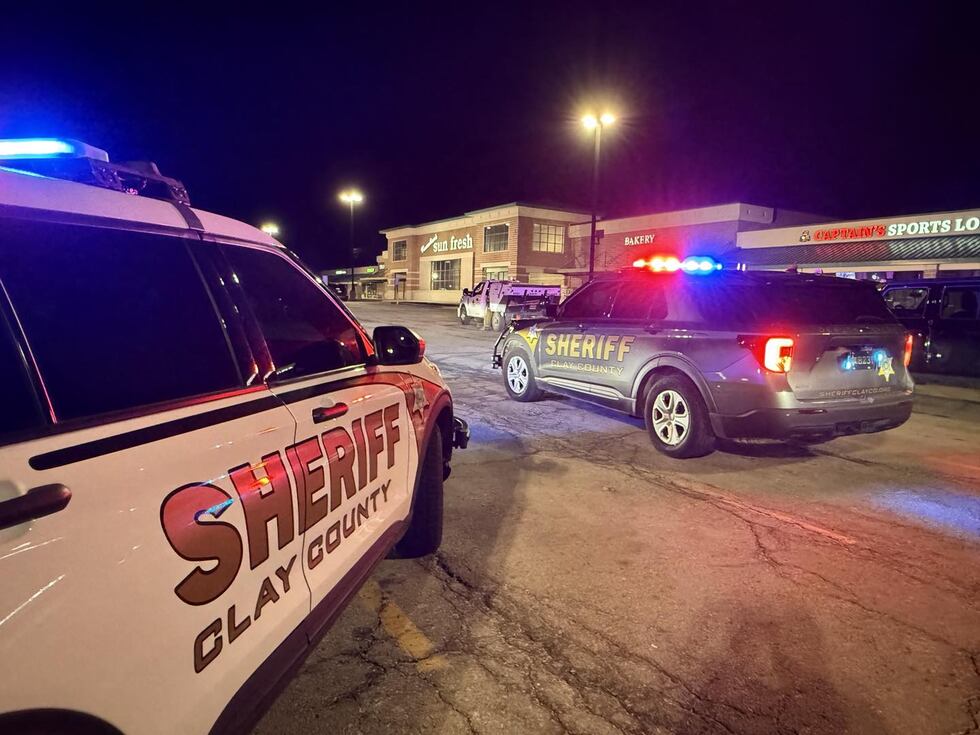 Law enforcement officials arrest the driver of a stolen street sweeper on March 11, 2025.