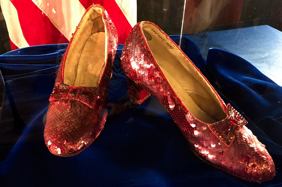 FILE - Ruby slippers once worn by Judy Garland in the "The Wizard of Oz" are displayed at a...