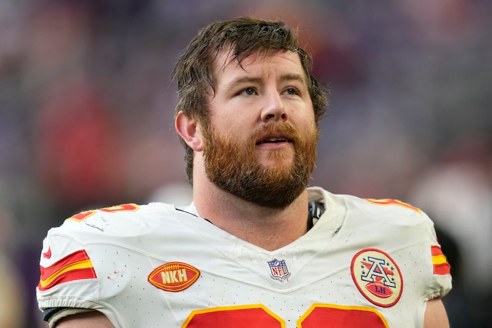 Kansas City Chiefs guard Joe Thuney stands on the field before the second half of an NFL...