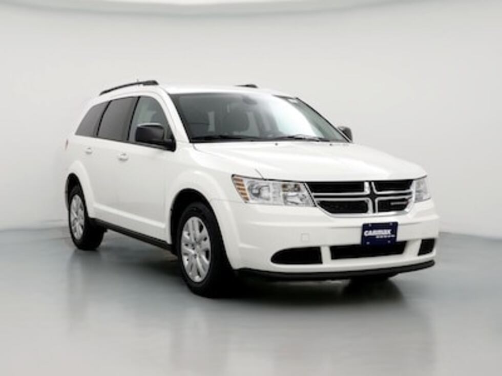 Photo of a stock white 2019 Dodge Journey