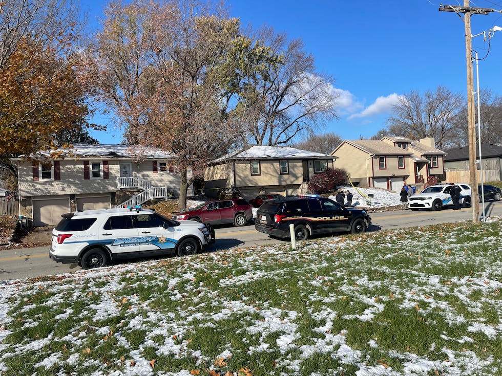 Police set up a crime scene outside the home of former KCKPD detective Roger Golubski.