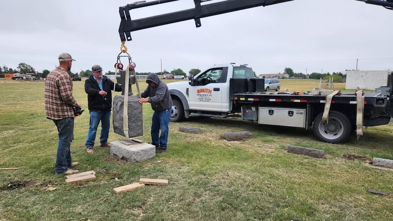 Volunteers repair Grinnell cemetery headstones after EF3 tornado