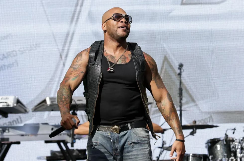 FILE - In this April 1, 2015 file photo, Flo Rida performs on stage at the “Furious 7"...