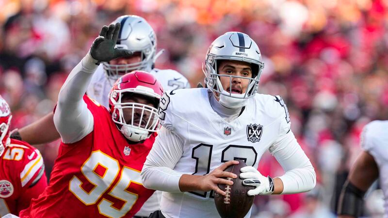 Kansas City Chiefs defensive tackle Chris Jones (95) pressures Las Vegas Raiders quarterback...