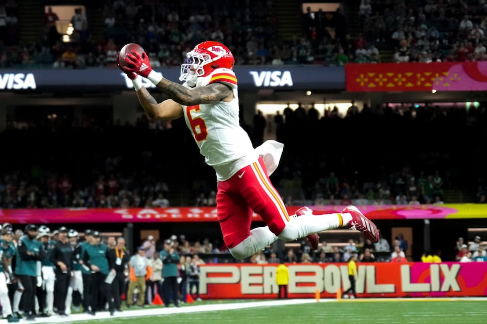 Kansas City Chiefs safety Bryan Cook (6) intercepts a during the first half of the NFL...
