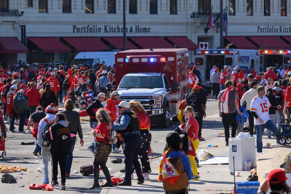 Police clear the area following a shooting at the Kansas City Chiefs NFL football Super Bowl...
