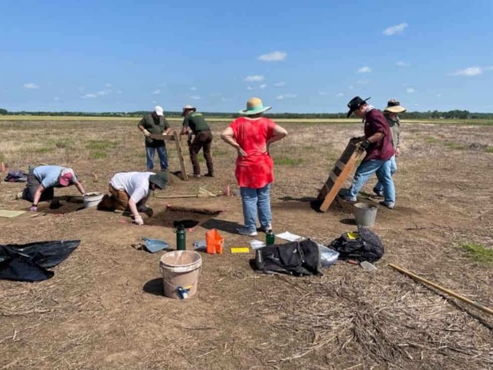 KU students dig at site believed to have been the Benders homestead.
