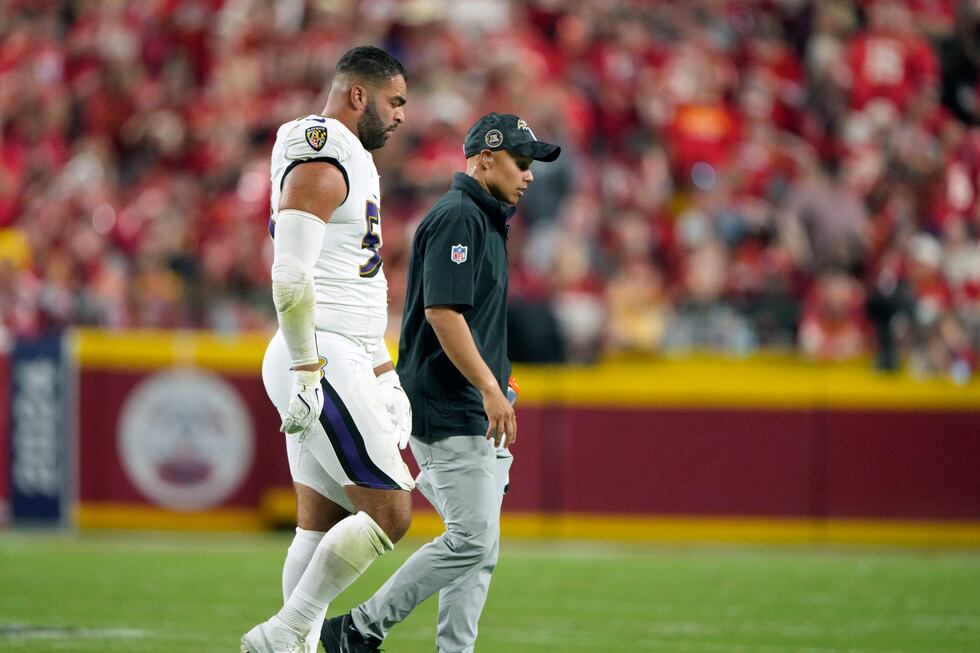 FILE - Baltimore Ravens outside linebacker Kyle Van Noy walks of the field after being injured...