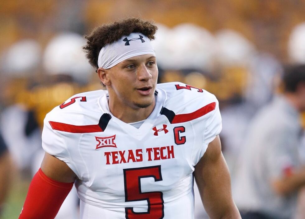 Texas Tech's Patrick Mahomes II (5) walks with teammates off the field prior to an NCAA...