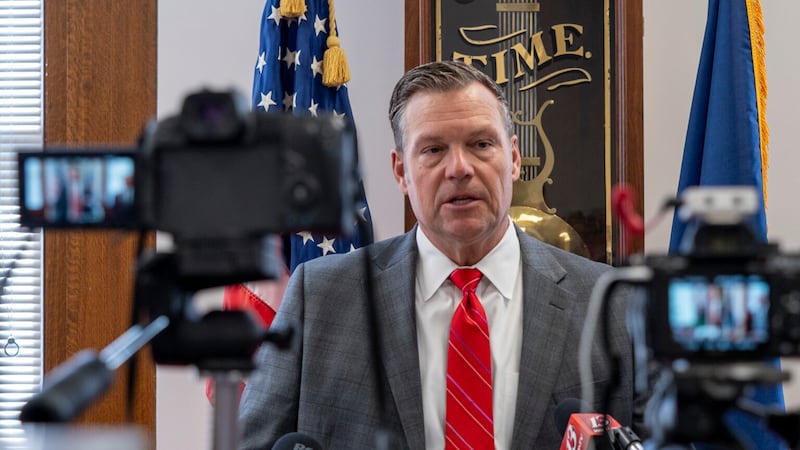 A Kansas district court judge sanctioned Attorney General Kris Kobach with a \$1 fine for...
