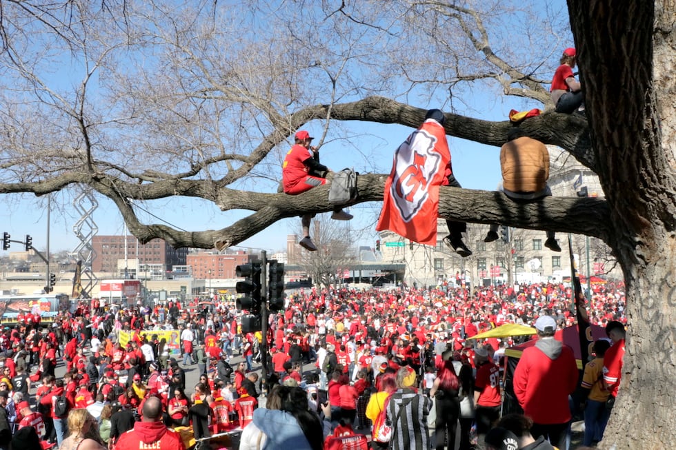 Aundrea and Milana watched the rally from below a tree at Pershing and Kessler Roads