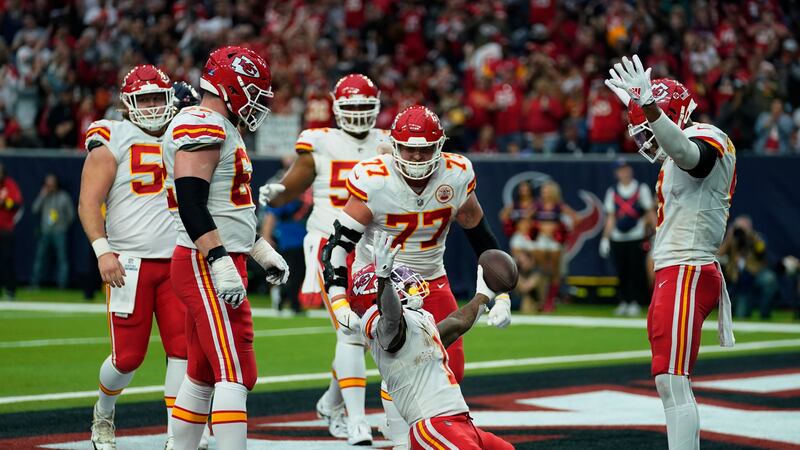Kansas City Chiefs running back Jerick McKinnon (1) celebrates with teammates after making a...