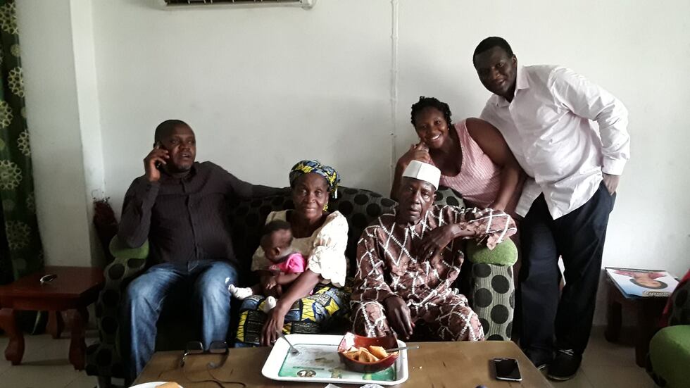 Dr. Onema Adojoh with his family in Nigeria.