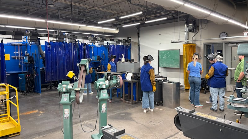 Twenty-eight middle and high school girls worked on welding and electrical work at the camp,...