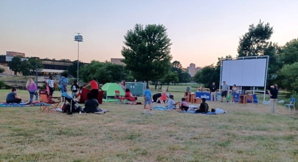 MDC for free outdoor movie screenings at the Discovery Center, as photographed above, in...